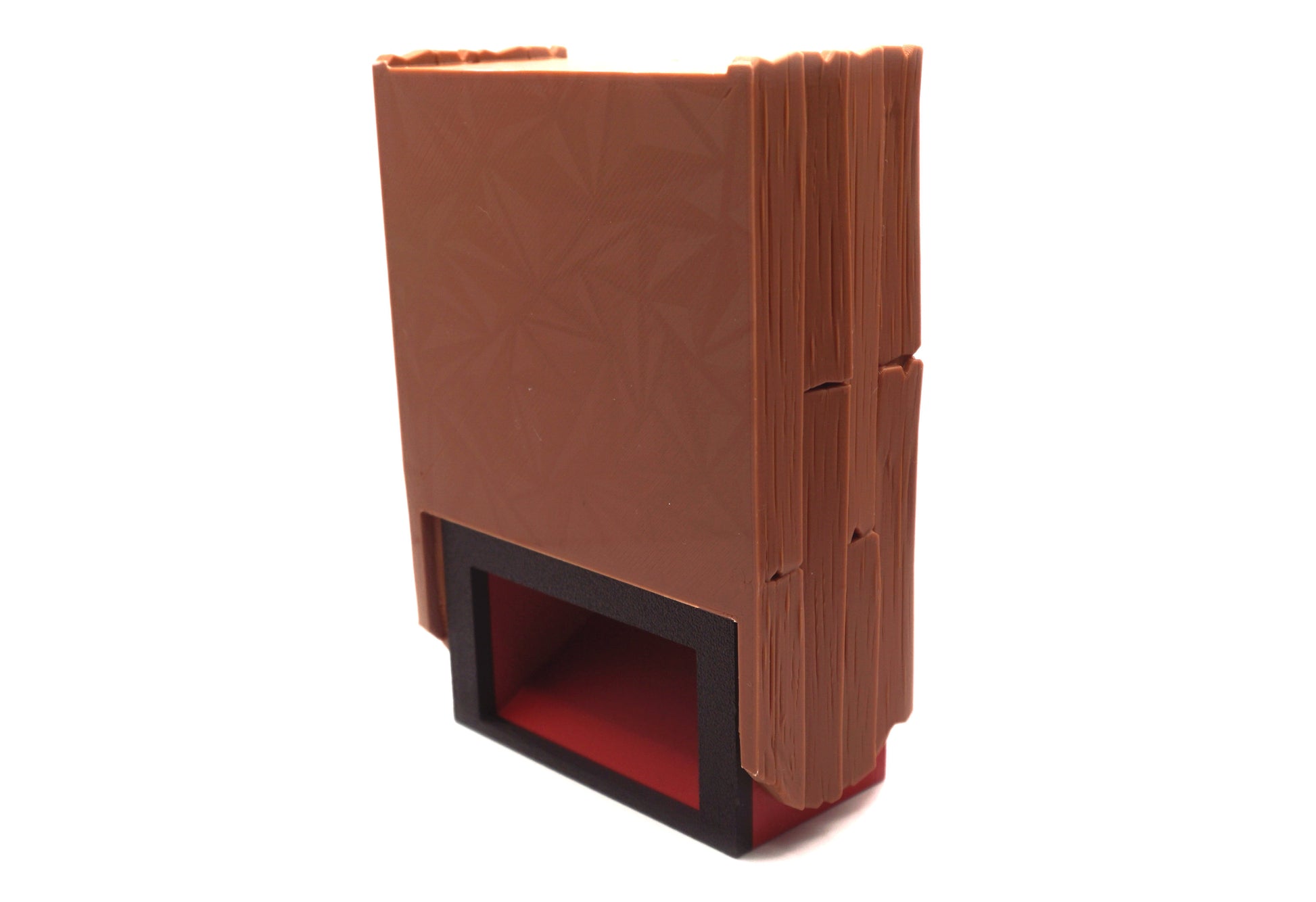 A collapsed view of what the One Piece Dice Tower looks like when the tray is closed for travel. The bottom of the tray shows a diamond pattern on the surface.