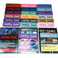 Ability Used markers for TCG and Tabletop gameplay. Shown in a variety of colors against a white background. Three of which are on top of cards from Pokemon, One Piece, and Lorcana