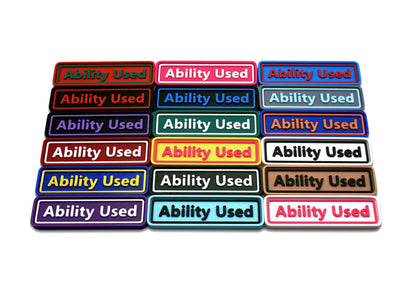 Ability Used markers for TCG and Tabletop gameplay. Shown in a variety of colors against a white background.