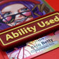 A red Ability Used marker with yellow text shown on top of a Belo Betty card from the One Piece TCG.