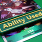 A green Ability Used marker with yellow text shown on top of a Uta card from the One Piece TCG.