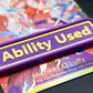 A purple Ability Used marker with yellow text shown on top of a Luffy card from the One Piece TCG.