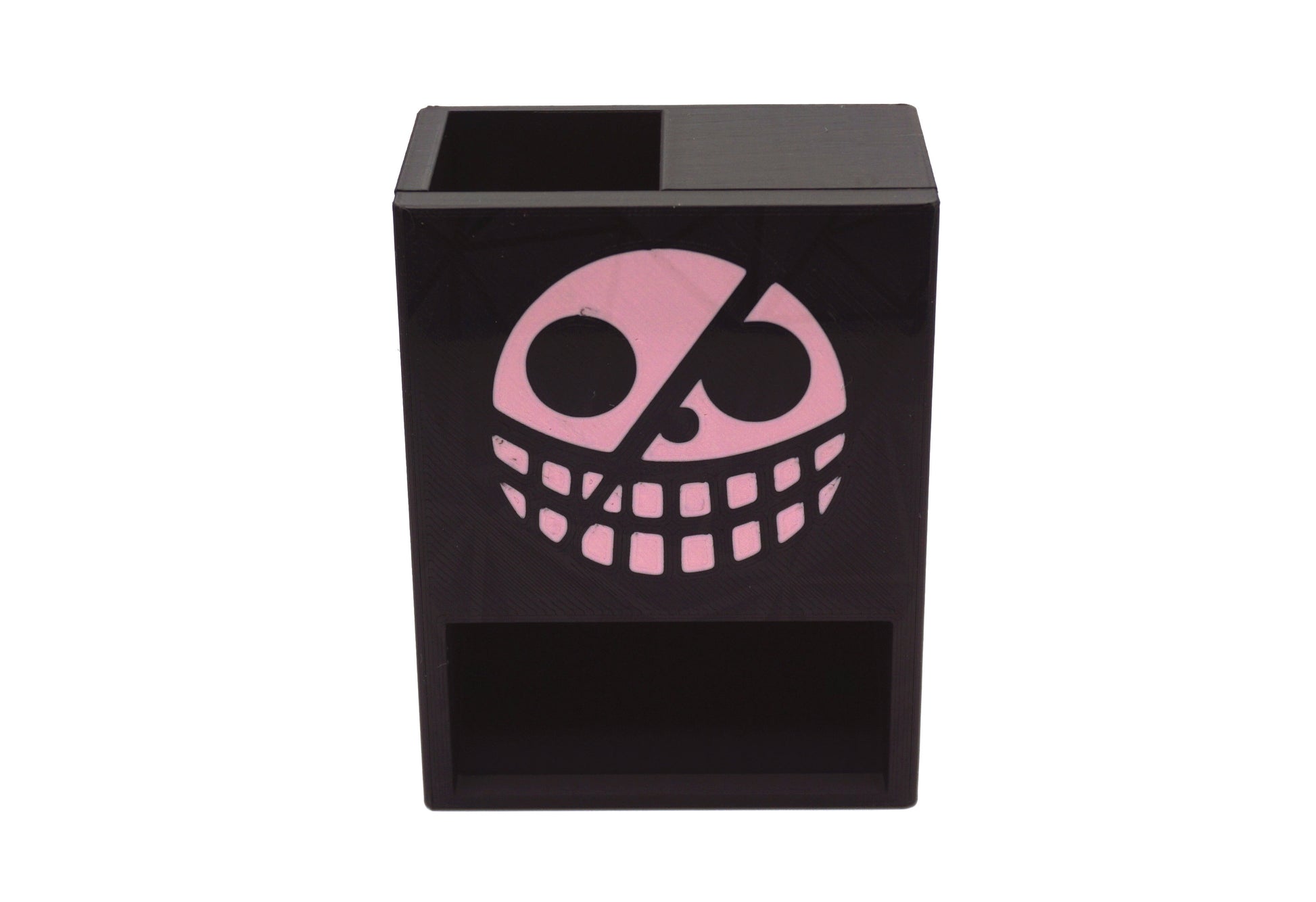 Close up picture of the Donquixote pirates jolly roger on the One Piece Mini Dice Tower against a white background