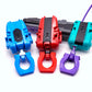 Beyblade X Slip Grip for string and winder launchers, showing the Sky blue, Cherry, and Purple color options on their respective color matching launchers.