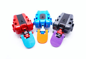 The Beyblade X Launcher Tab displayed in 3 colors, sky blue, orange, and purple, on different colored string launchers against a white background