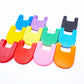 All color options for the Beyblade X Launcher Tabs, red, cherry, pink, orange, yellow, lime, green, sky blue, blue, purple, white, black