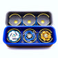 The Beyblade X Deckbox from Momo's Models in 2 different color combinations, black and sky blue for one then blue and gold for the other. Both angled to show the inside cups that hold the beyblades. With Pegasus Blast, Cerberus Flame, and Emperor Might in one of the deckboxes