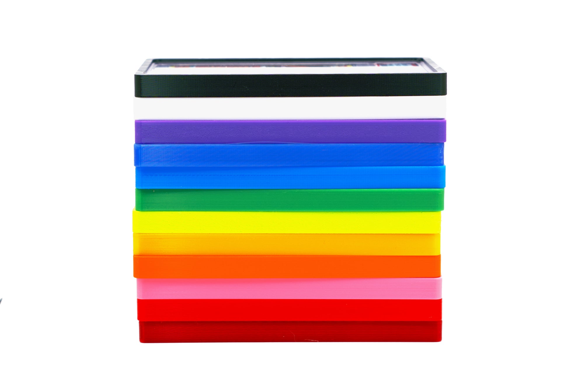 All 12 of the color options of the PSA Card Slab Protector shown. This includes Red, Cherry, Pink, Orange, Yellow, Lime, Green, Sky Blue, Blue, Purple, White, Black