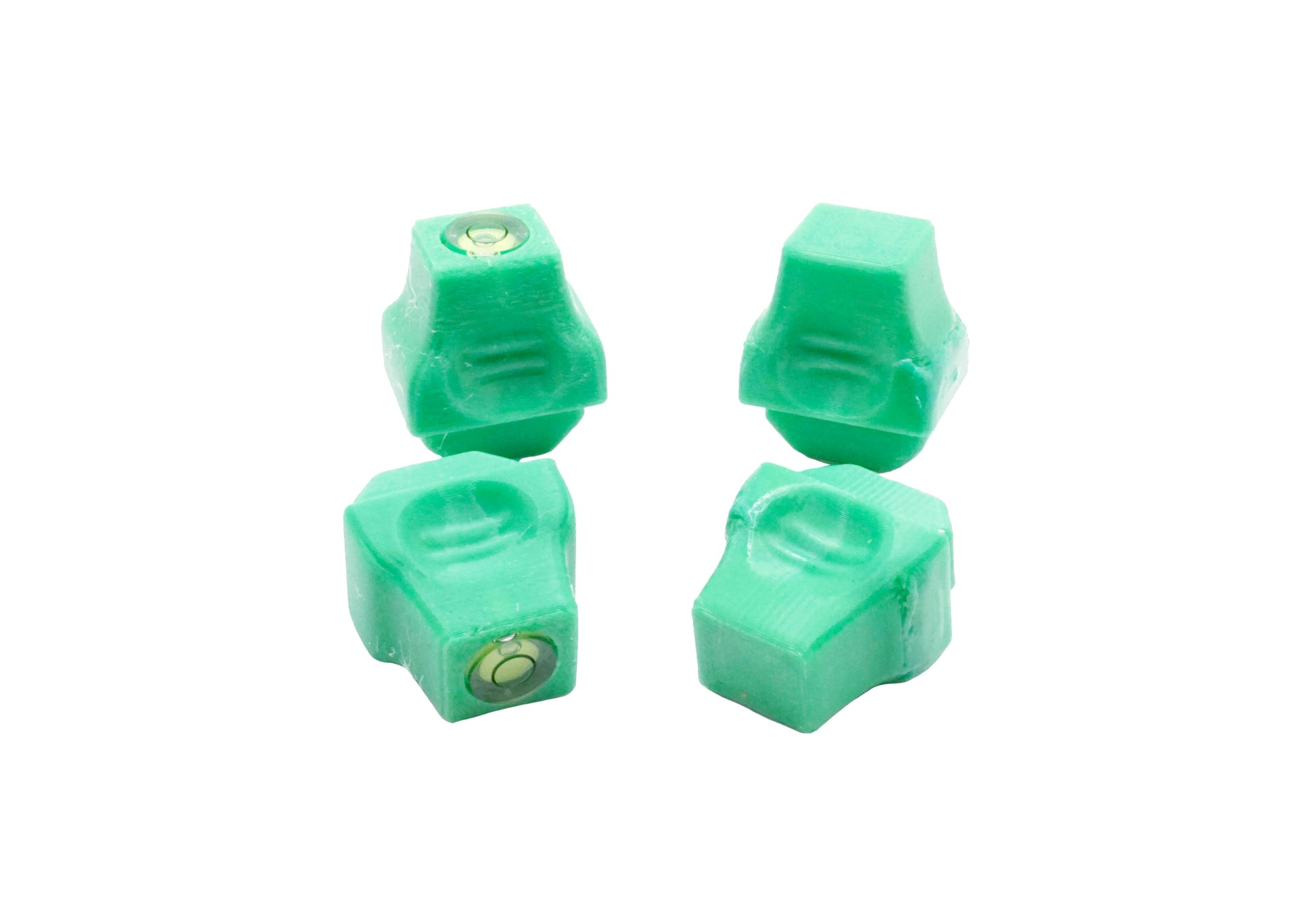 The Stadium Level Locks for Beyblade X stadiums shown in green. With two having levels and two without levels. These will work for both Takara Tomy and Hasbro stadiums