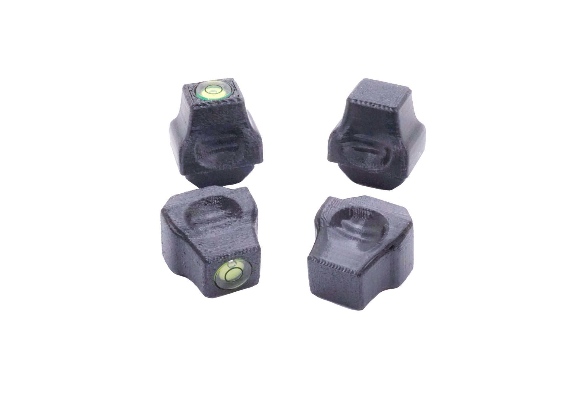 The Stadium Level Locks for Beyblade X stadiums shown in black. With two having levels and two without levels. These will work for both Takara Tomy and Hasbro stadiums