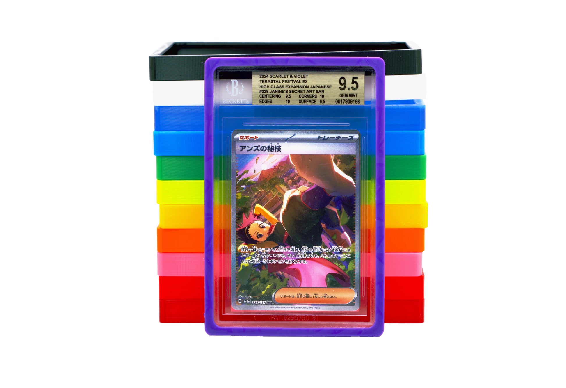 The Beckett Card Slab Protector in sky purple with Janine from the Pokemon TCG. With the rest of the 11 colors shown behind it in a stack against a white background.