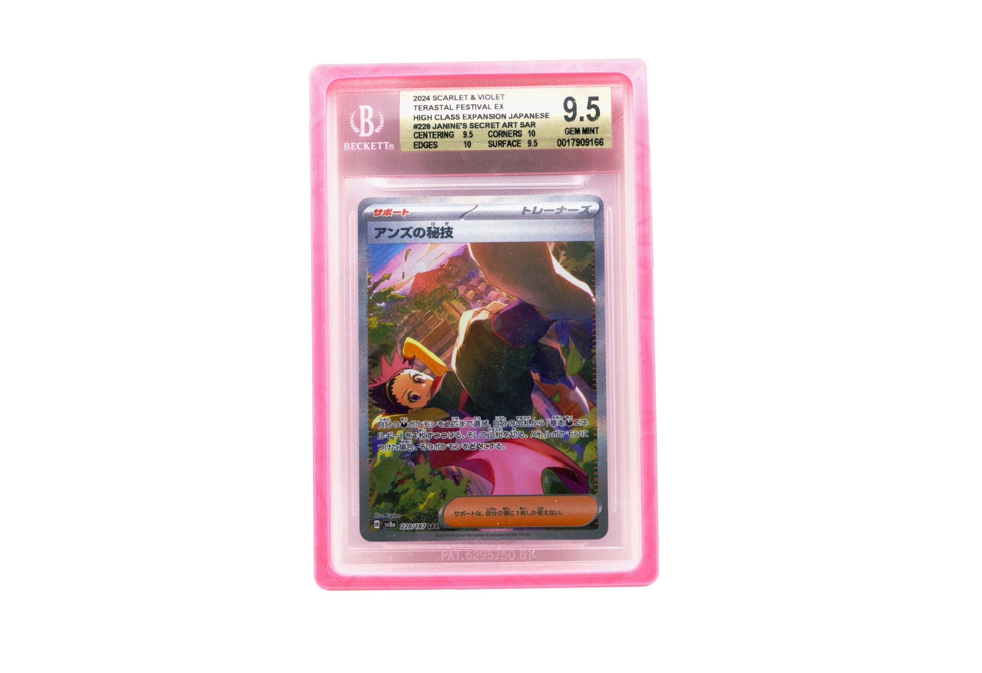 The pink Beckett Card Slab Protector shown with Janine from the Pokemon TCG in it against a white background