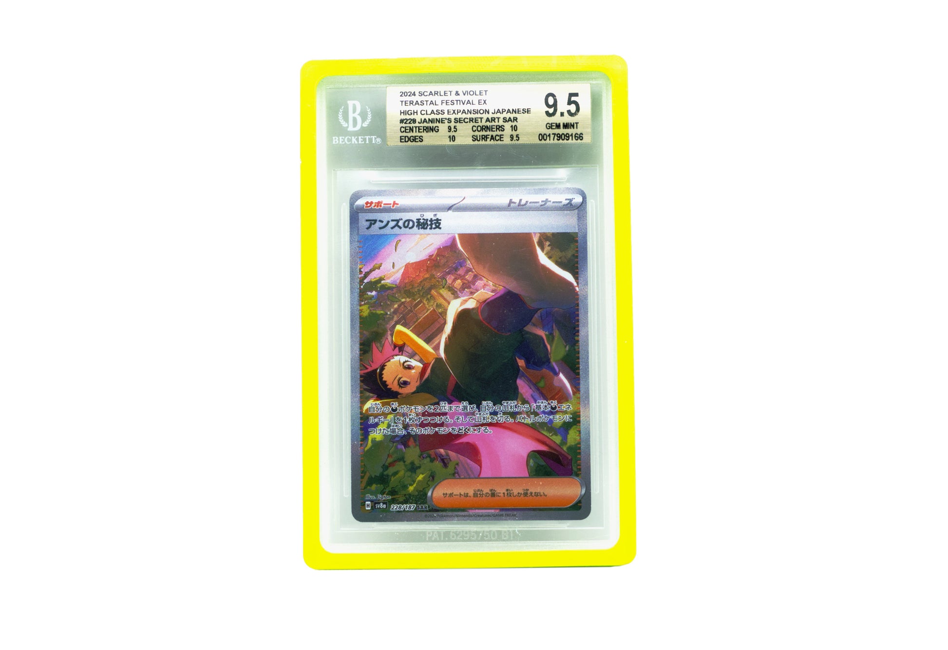 The lime Beckett Card Slab Protector shown with Janine from the Pokemon TCG in it against a white background