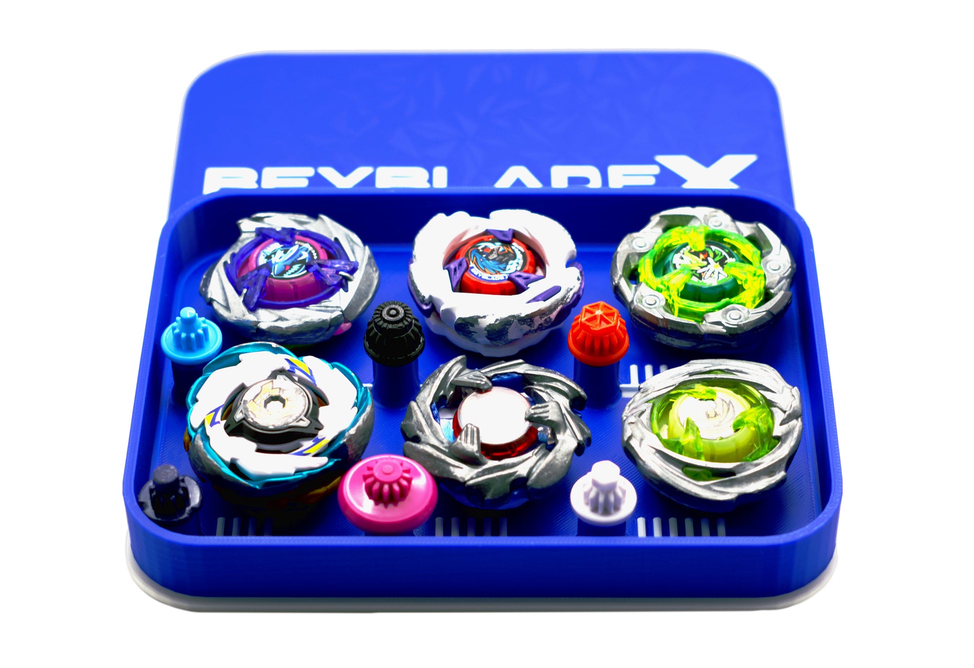 The Pocket Deck Box that holds 6 beys for Beyblade X shown in the blue and white color combination. Showcasing Shark Scale, Meteor Dragoon, Wizard Rod, Emperor Pegasus Blast, Cobalt Dragoon, and Hover Wyvern. 