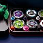 The Pocket Deck Box that holds 6 beys for Beyblade X shown in the black and red color combination. Showcasing Shark Scale, Meteor Dragoon, Wizard Rod, Emperor Pegasus Blast, Cobalt Dragoon, and Hover Wyvern. Sitting on a table with the lid flipped over and holding the green and black string launcher with the green Slip Grip Tab from Momo's Models.