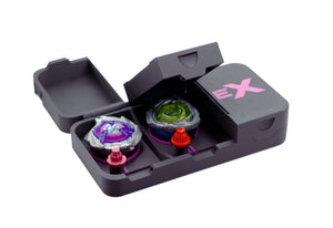 The Beyblade X Pocket Clam Shell Deck Box in Black and Hot Pink. Shown with the first slot open and the second partially open. With Shark Scale 1-70 Low Rush and Hover Wyvern (Pringle) 1-50 Kick. Against a white background.