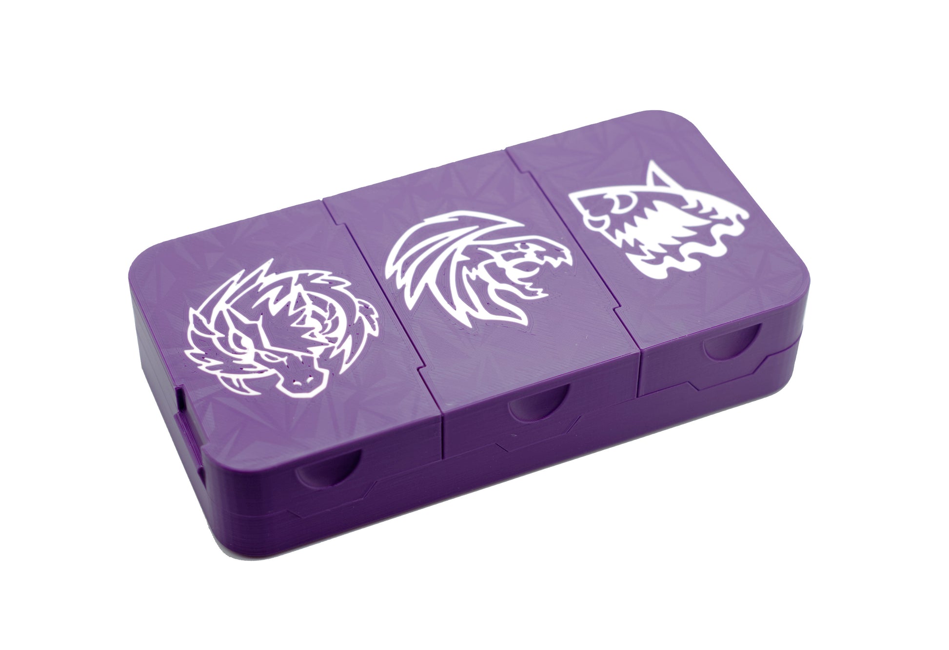 The Beyblade X Pocket Clam Shell Deck Box shown in purple and white. Showing off that each section can have it's own icon for complete customization of your deck box
