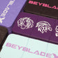 A variety of the Beyblade X Pocket Clam Shell Deck Boxes