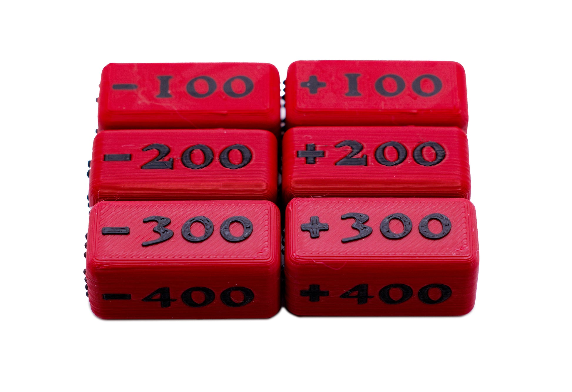 Close up of a full set 100-400 Attack Increase/Decrease Markers shown in Ruby/Black