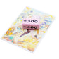 Showing a single negative 300 value Attack Marker on top of a card sleeve to compare sizes
