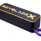 A Beyblade X Slam Shell EX storage case in black with a diamond pattern, featuring gold lettering and a purple carrying loop, shown on a white background.