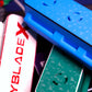 A variety of the Slam Shell EX deck boxes sitting on a table with a string launcher in the background. Showing the bottom of the Slam Shell EX deck box with the launcher holder.