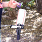 Holding the Slip Grip on a rip cord to hold the Slam Shell EX deck box shown in white with red trim, while a ripcord launcher is attached to the bottom of the deck box