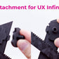 A close-up demonstration showing a black 3D-printed attachment piece being fitted onto the right side of the Trophy Stand for Beyblade X, with a hand holding the component. Pink text at the top reads 'Attachment for UX Infinity' on a white background.