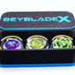 The Beyblade X Deckbox from Momo's Models shown in the black and sky blue color combination. With the lid sitting behind the base that has the Shark Scale, Hover Wyvern Pringle and Wizard Rod beyblades inside it. With everything against a white background