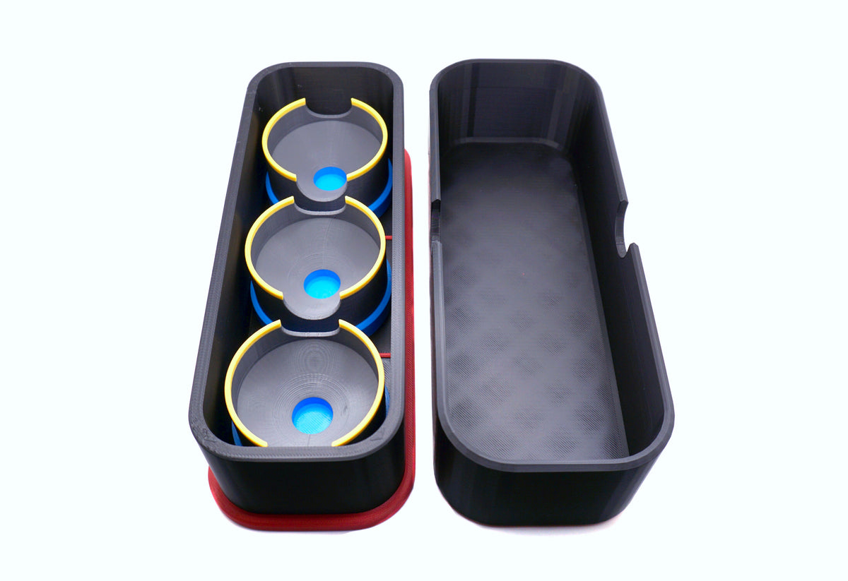 A side view of the inside base and top of the Beyblade X Deckbox from Momo's Models in the black and red color combination