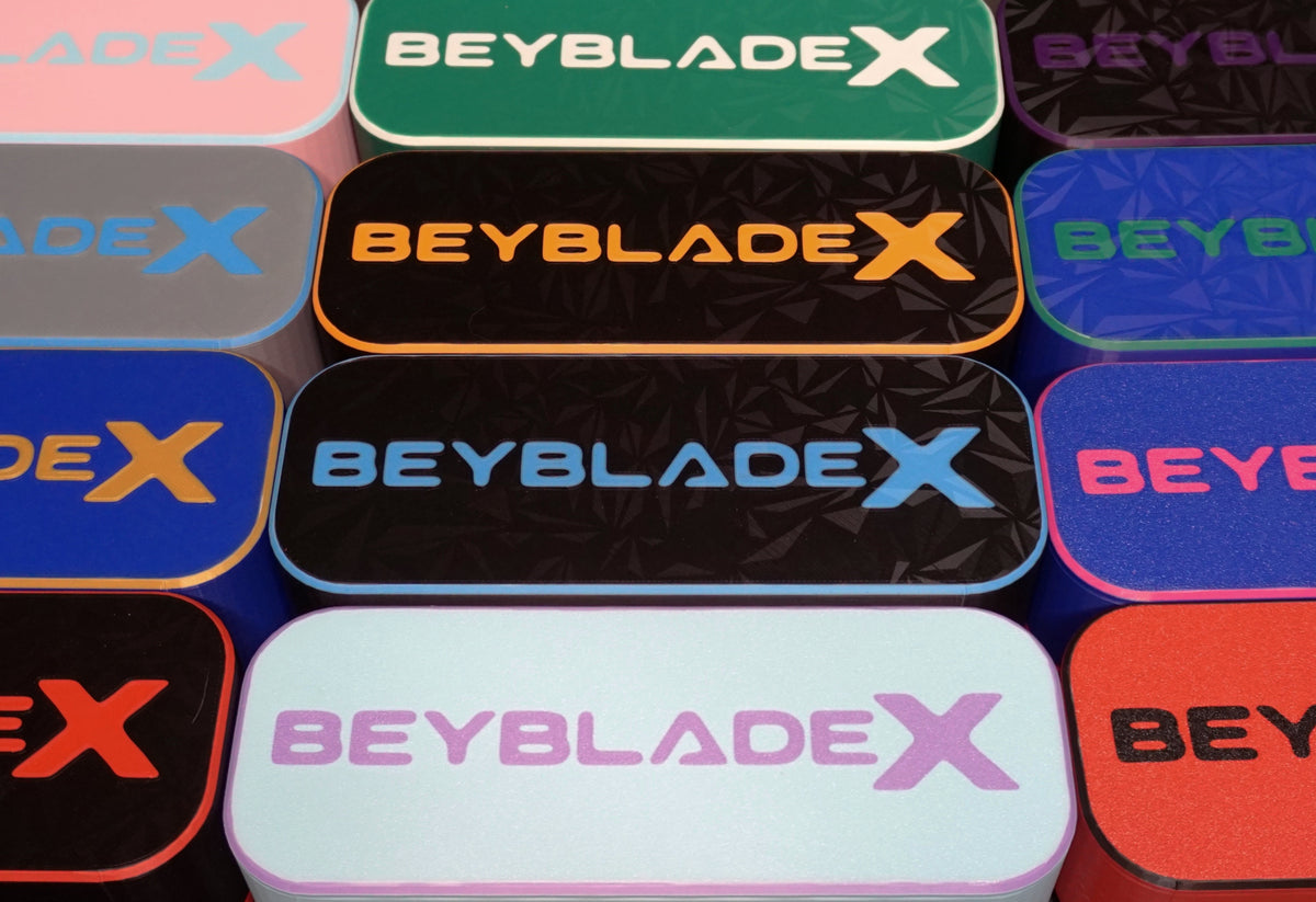The Beyblade X Deckbox from Momo's Models shown in various color combinations that can be picked.