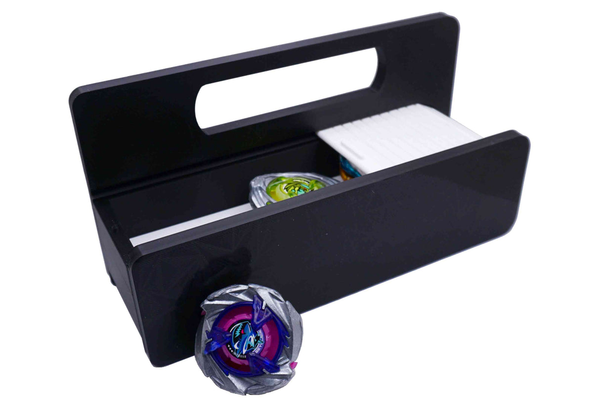 The Garage Style deck box with handle in black with white door and tray with Shark Scale, Hover Wyvern, and Emperor Blast against a white background