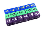 Mini Positive Dice shown in multiple color combinations with the various digits available on the dice, all against a white background