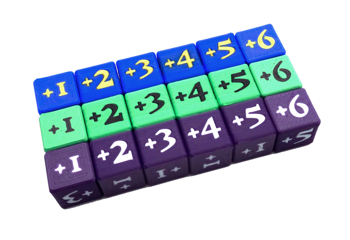 Mini Positive Dice shown in multiple color combinations with the various digits available on the dice, all against a white background