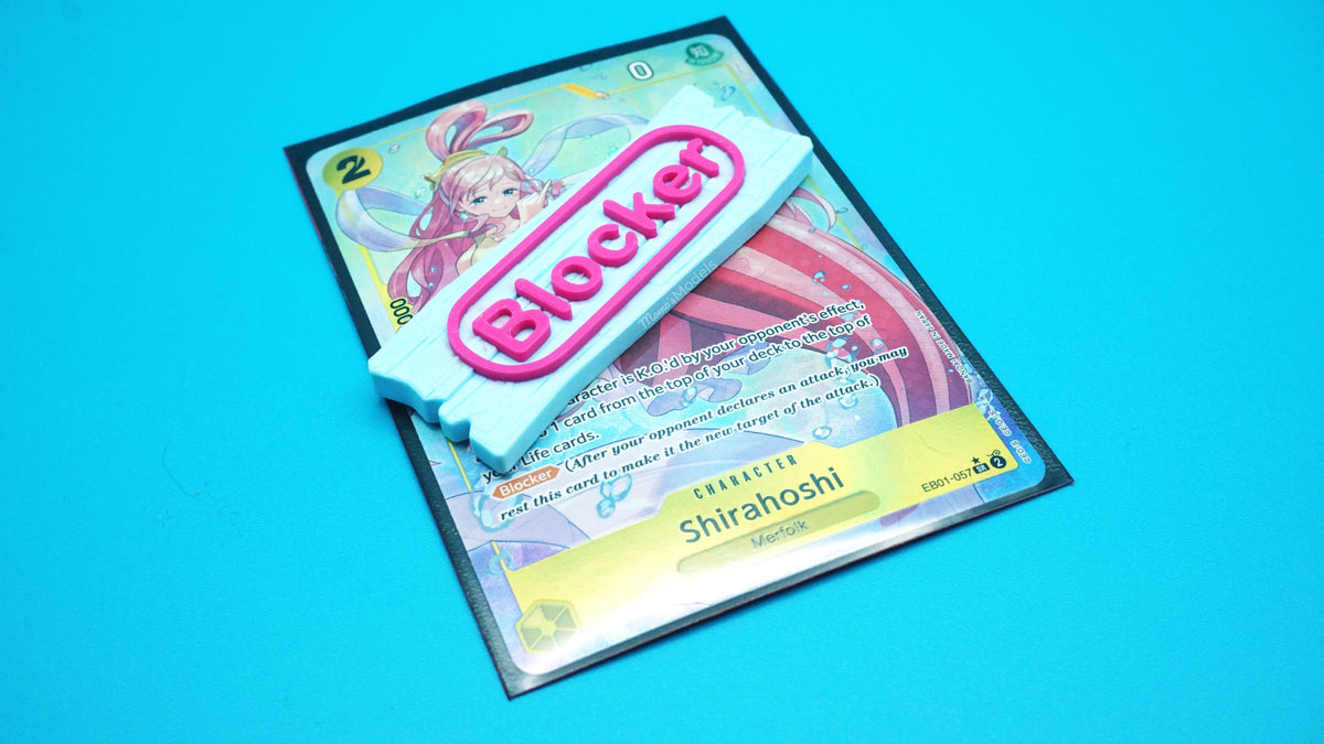 Blocker Ability Marker shown in Glacier and Hot Pink on top of a Shirahoshi card from the OPTCG