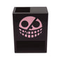 Close up picture of the Donquixote pirates jolly roger on the One Piece Mini Dice Tower against a white background