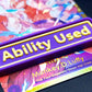 A purple Ability Used marker with yellow text shown on top of a Luffy card from the One Piece TCG.