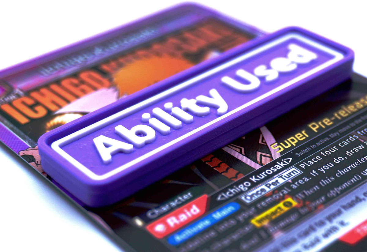 A purple Ability Used marker with white text shown on top of an Ichigo card from the Union Arena TCG.