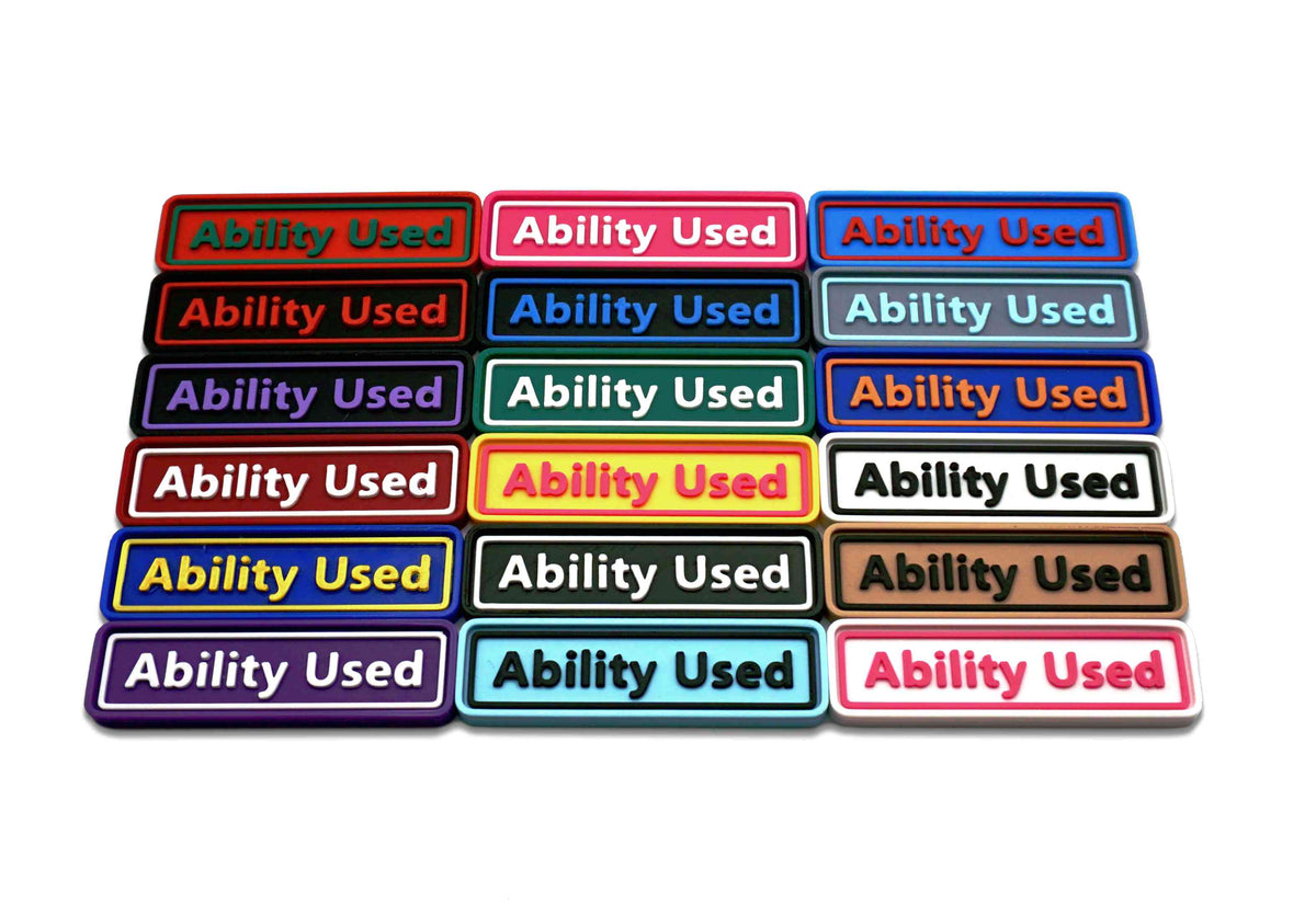 Ability Used markers for TCG and Tabletop gameplay. Shown in a variety of colors against a white background.