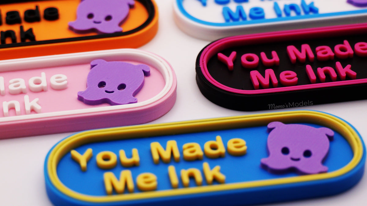 Colorful Lorcana TCG  markers with 'You Made Me Ink' text and Pearl in lavender on a white background.