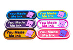 6 Colorful Lorcana TCG  markers with 'You Made Me Ink' text and Pearl in lavender on a white background.