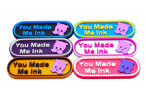 6 Colorful Lorcana TCG  markers with 'You Made Me Ink' text and Pearl in lavender on a white background.